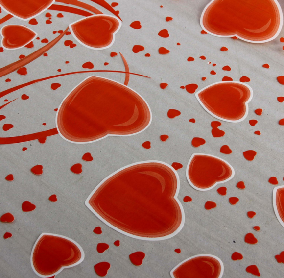 Пленка прозрачная с рисунком Лолита Оранжево-Белая 70см/200гр Пленка прозрачная с рисунком Лолита Оранжево-Белая 70см/200гр