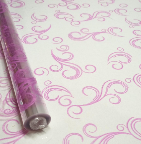 Пленка прозрачная с рисунком Завитки Фуксия 70см/200гр Пленка прозрачная с рисунком Завитки Фуксия 70см/200гр